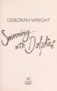 Swimming with dolphins / Deborah Wright.