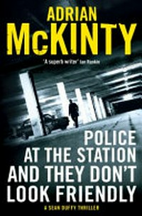 Police at the station and they don't look friendly / Adrian McKinty.